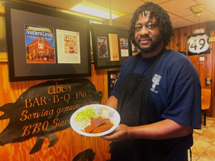 Kevin Smith makes tamales by hand in the kitchen at Abe's BBQ and Tamales along the Tamale Trail in Clarksdale.