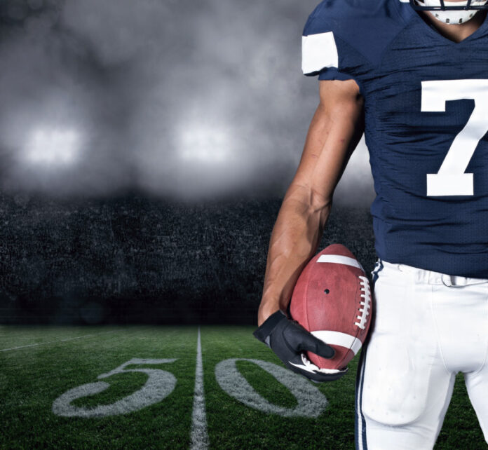 Football,Player,On,At,The,Stadium.,Close,Up,View