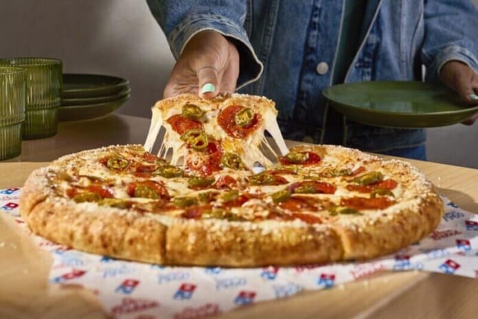 Domino's is now offering Parmesan Stuffed Crust – a delicious, new crust made of premium buttery-flavored dough, stuffed with melty cheese made with 100% real mozzarella, and topped with garlic seasoning and a sprinkle of Parmesan.