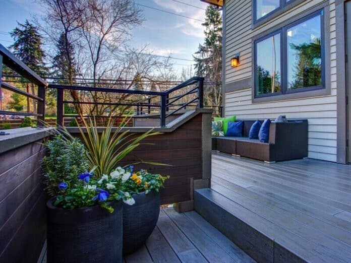 New construction home exterior boasts luxury deck latest deck design trends to watch for in 2026