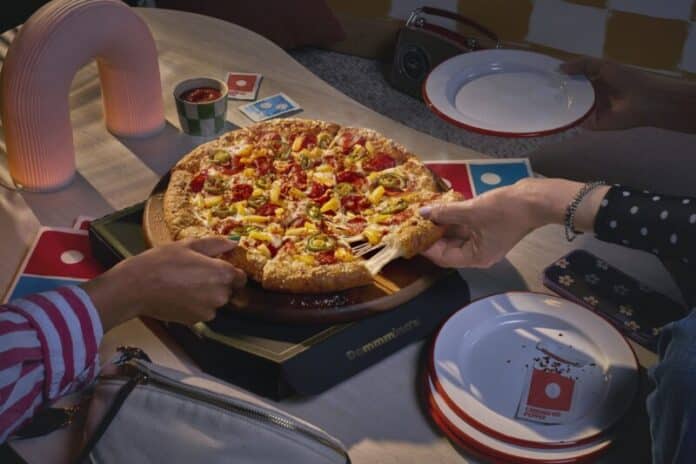 50-Percent-Off-July-dominos Domino’s is serving up summer savings by offering 50% off all menu-priced pizzas July 27-Aug. 2.