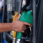 Tennessee Gas Prices Climb 11 Cents as Crude Oil Surges gas pump stock photo